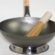 wok gryde med håndtag rundbundet til gas